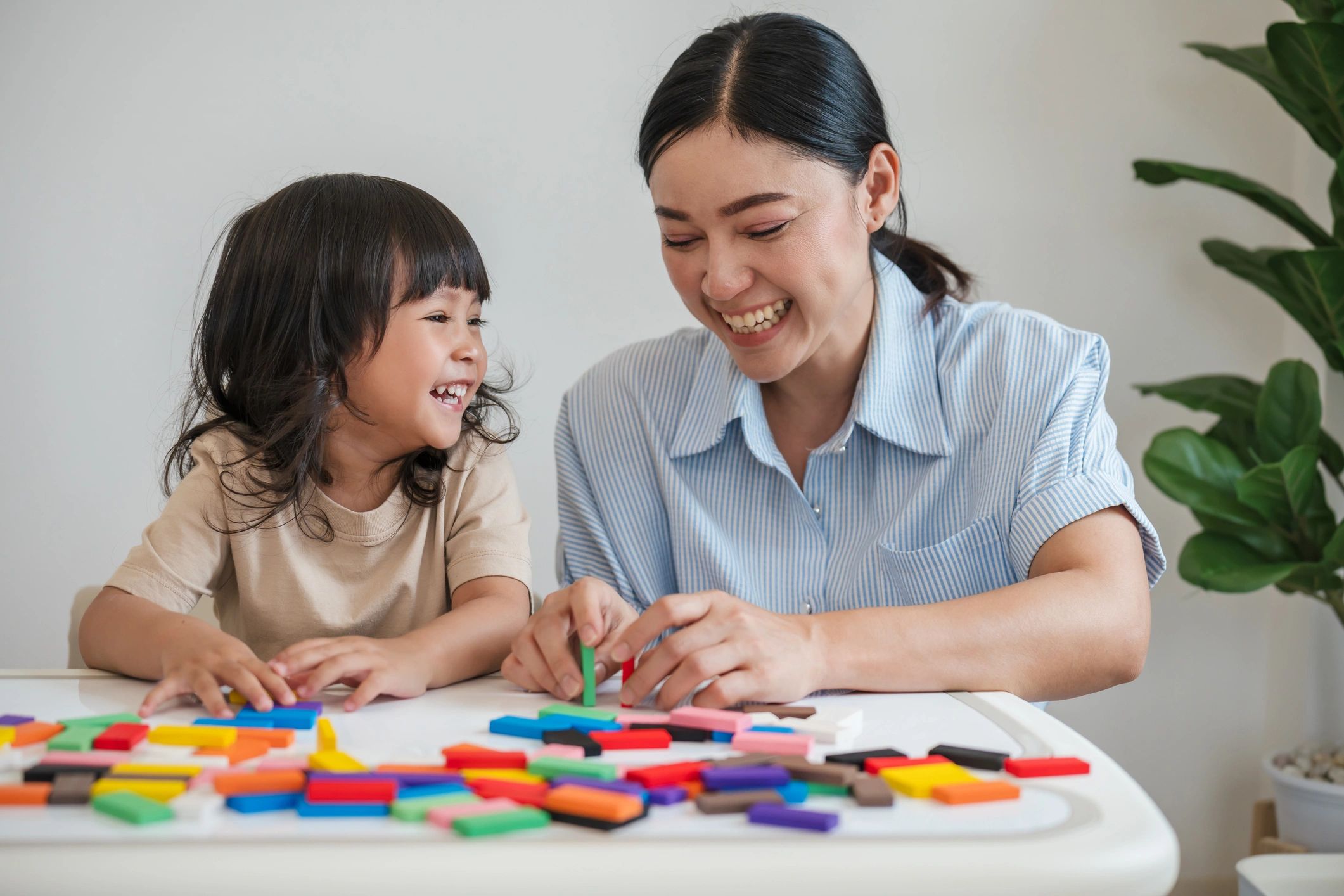 Child and therapist working together
